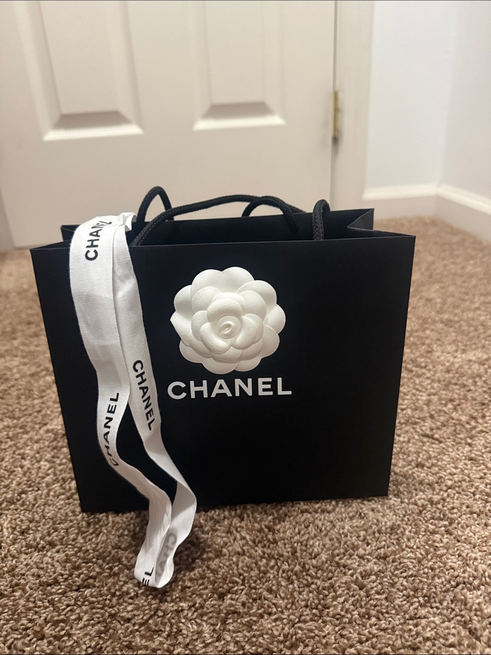CHANEL Black Gift Bag with White Camellia and Ribbon